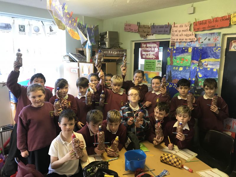 Making bird  feeders in fourth class