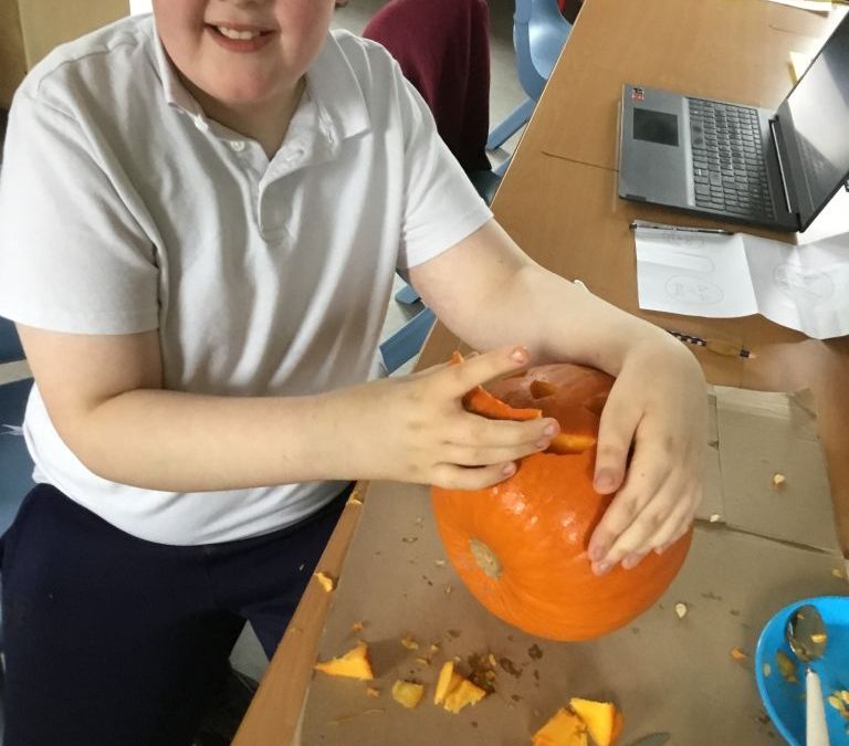 Halloween – Harvesting and Carving our Pumpkin. Dressing our Scarecrow